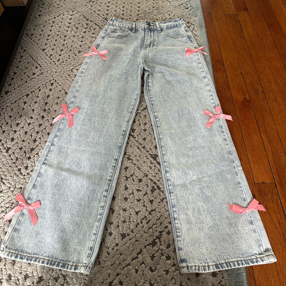 Stylish Light Blue Jeans with Pink Bows
